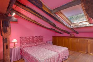 Postel nebo postele na pokoji v ubytování Casona De La Salceda