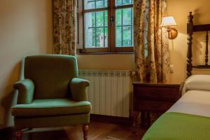 Postel nebo postele na pokoji v ubytování Casona De La Salceda