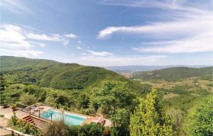 a villa with a swimming pool in the hills at Casetta 2 in Loro Ciuffenna