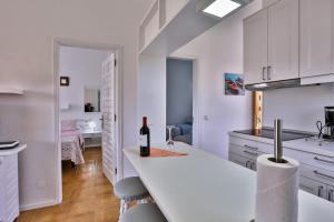 A kitchen or kitchenette at Bungalow Santa Fe de 2 habitaciones