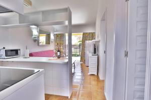 A kitchen or kitchenette at Bungalow Santa Fe de 2 habitaciones