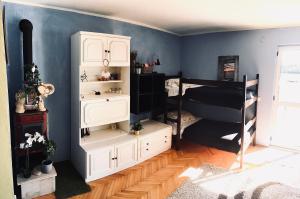 a room with a bedroom with a bunk bed at Large Terrace Apartment in Korčula
