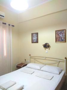 Posteľ alebo postele v izbe v ubytovaní OLEA Apartments