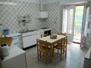 Kuchyň nebo kuchyňský kout v ubytování Casa de Landa