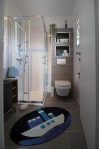 Kúpeľňa v ubytovaní Apartman Cicibella + 37 fotografií