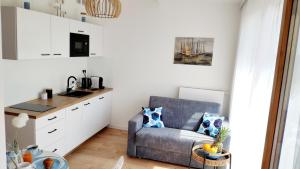 Fotografia z galérie ubytovania Blu Bałtyk Apartament v destinácii Sarbinowo