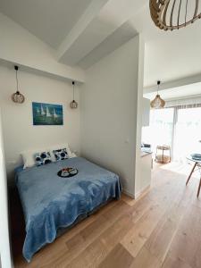 Fotografia z galérie ubytovania Blu Bałtyk Apartament v destinácii Sarbinowo