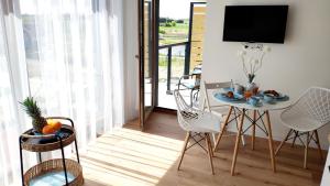 Fotografia z galérie ubytovania Blu Bałtyk Apartament v destinácii Sarbinowo