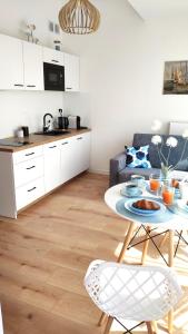 Fotografia z galérie ubytovania Blu Bałtyk Apartament v destinácii Sarbinowo + 20 fotografií