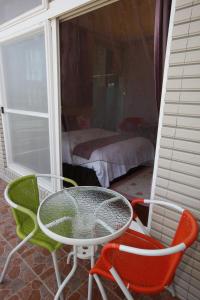 Postel nebo postele na pokoji v ubytování Jing Xiang Hua Nong B&B