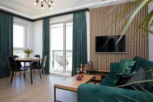 Μια τηλεόραση ή/και κέντρο ψυχαγωγίας στο Luxus Apartament Tulipan
