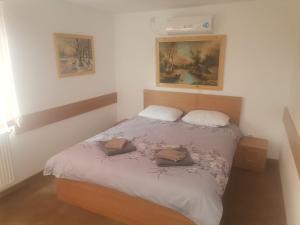מיטה או מיטות בחדר ב-Casa Viviana