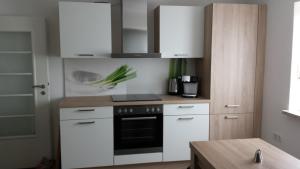 Küche/Küchenzeile in der Unterkunft FeWo Hafner "Zuhause mit Ausblick"