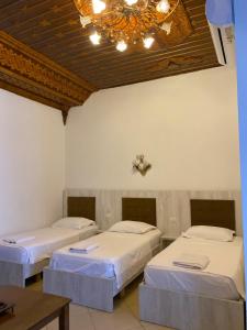 A bed or beds in a room at Kompleksi Jakaj