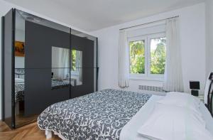 Posteľ alebo postele v izbe v ubytovaní Apartman MAMI-KROK