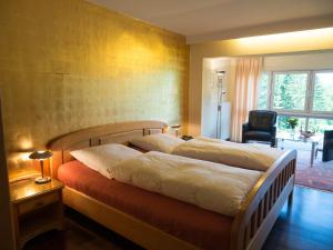 Postel nebo postele na pokoji v ubytování Hotel Landhaus Berghof