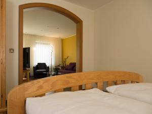 Postel nebo postele na pokoji v ubytování Hotel Landhaus Berghof