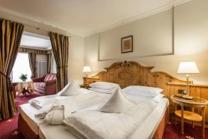 Postel nebo postele na pokoji v ubytování Hotel Christiania