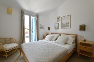 En eller flere senger på et rom på casa vacanze La Dolce sosta