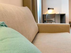Posezení v ubytování Hotel Quatre Llunes