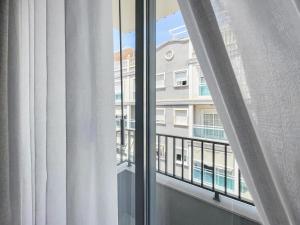 Bazén v ubytování Hotel Quatre Llunes nebo v jeho okolí