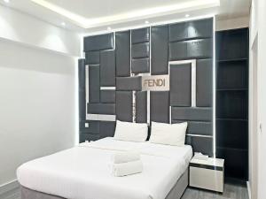 Postel nebo postele na pokoji v ubytování Modern Panoramic Sea View 3BR Apartment on JBR Walk