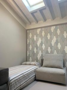 Katil atau katil-katil dalam bilik di Maison del Ducato “Cavour 24”