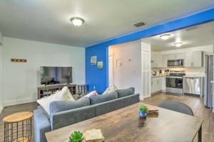 a living room with a couch and a table at Beautiful Miami Getaway Less Than 6 Mi to Downtown! in Miami +16 photos