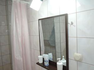A bathroom at Bungalow in Miedzyzdroje near the seashore for 4 persons