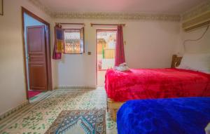Postel nebo postele na pokoji v ubytování Riad Fes Basma