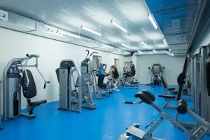 a room filled with lots of different types of equipment at wellnessHostel4000 in Saas-Fee