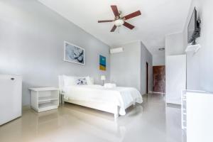 Voodi või voodid majutusasutuse Bella Vida Hotel Punta Cana toas