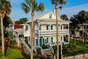 an aerial view of a white house with palm trees at Bayfront Westcott House Bed & Breakfast in St. Augustine