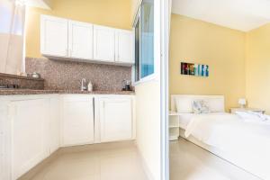 Voodi või voodid majutusasutuse Bella Vida Hotel Punta Cana toas