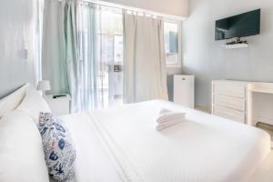 Voodi või voodid majutusasutuse Bella Vida Hotel Punta Cana toas