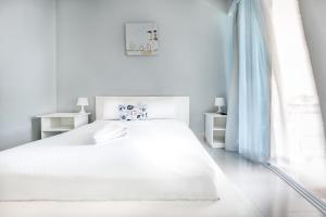 Voodi või voodid majutusasutuse Bella Vida Hotel Punta Cana toas