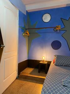 Ein Bett oder Betten in einem Zimmer der Unterkunft Zebulo Hostel