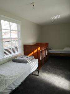 Afbeelding uit fotogalerij van Cheerful 4 Bedroom Holiday Home (Sleeps 7) in Rotorua