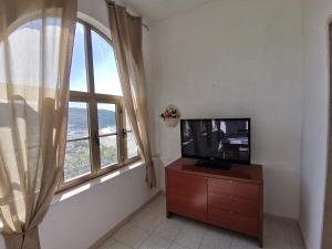 TV a/nebo společenská místnost v ubytování Casa Vacanze La Cantinetta