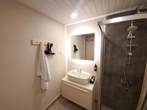 Kylpyhuone majoituspaikassa Sun Hotel By En Vie Beach