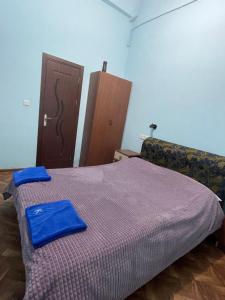 Voodi või voodid majutusasutuse Kataryn Hostel toas