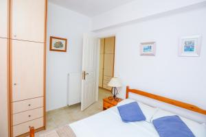 Postel nebo postele na pokoji v ubytování Skiathos Seaview Villa with Pool