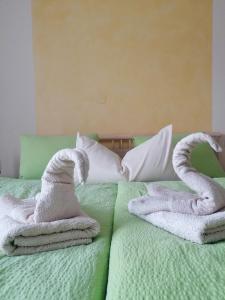 Letto o letti in una camera di Pension Stausee