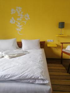 Letto o letti in una camera di Pension Stausee