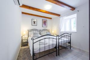 Posteľ alebo postele v izbe v ubytovaní Villa Lizza