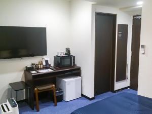 Kuhinja oz. manjša kuhinja v nastanitvi HOTEL LiVEMAX Yokkaichi Ekimae