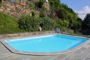 Bazén v ubytovaní Appartamenti Ferrari Residence alebo v jeho blízkosti