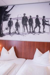 Letto o letti in una camera di Hotel Winterberg Resort