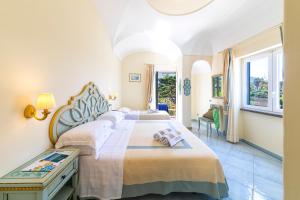 Hotel Terme Tritone Resort & Spa客房内的一张或多张床位