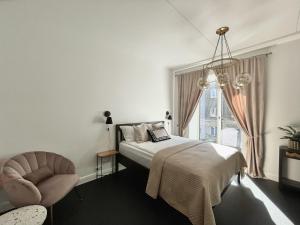 Postel nebo postele na pokoji v ubytování VH Apartments Reimani